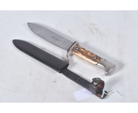 A GERMAN CARL SCHMIDT SOHN HUNTING STYLE DAGGER, one side of the blade had the makers mark plus Ges Gesch and the name Carl S