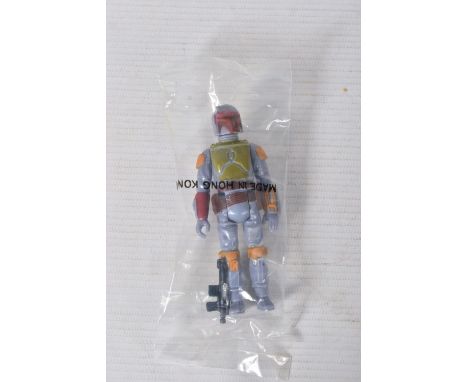 A SEALED BOBA FETT FIGURE, 1979, signed to the leg CPG, figure in perfect condition with gun present, inside a sealed plastic