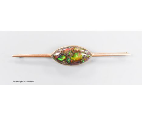   A yellow metal and navette shape opal doublet? set bar brooch, 86mm, gross weight 10.3 grams.