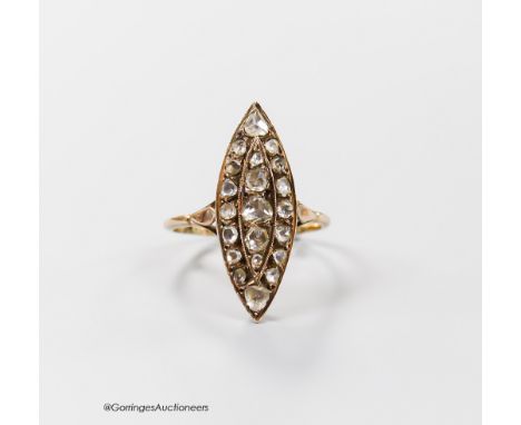   An antique continental yellow metal and rose cut diamond cluster set marquise shape dress ring, size J/K, gross 3 grams.