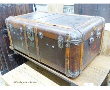   A vintage wood bound travelling trunk, length 102cm, depth 60cm, height 43cm