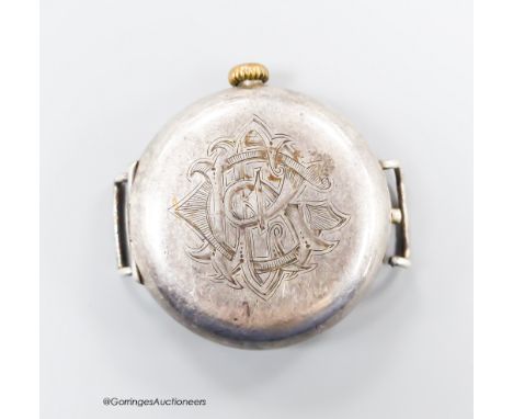   An early 20th century silver Rolex manual wind hunter trench watch with Arabic dial and subsidiary seconds, no strap, part 