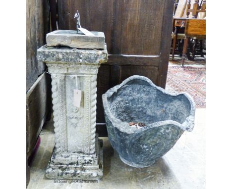   A copper sundial on reconstituted stone plinth, height 73cm together with a circular cast lead planter, diameter 43cm