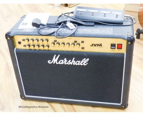   A Marshall JVM 210C 100 V valve amplifier with 4 way foot switch, c.2019
