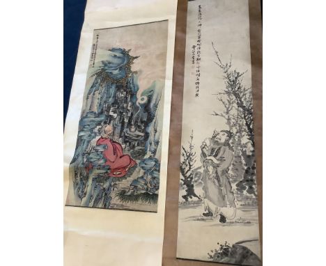  Two Chinese scroll paintings on paper, 20th century, depicting a Luohan in a cave and a scholar amid prunusImages 103 cm X 