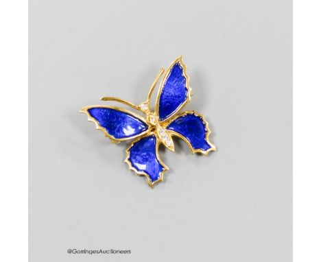   A modern 18ct gold, blue enamel and diamond set butterfly brooch, 22mm, gross weight 5.7 grams.
