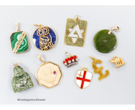   A small collection of ten assorted mainly yellow metal and gem set pendants including a red enamel and diamond set coronet 