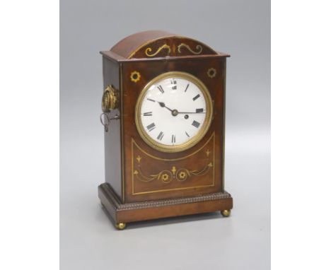   A George IV brass inlaid mahogany mantel clock, with keys and pendulum, height 28cmSingle fusee movement