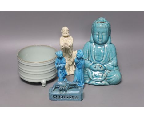   A Chinese turquoise glazed Buddha, height 21cm, a pair of figurines, a robin’s egg glazed model of a lobster, and a tripod 