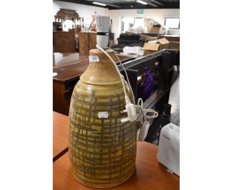 A mid century studio pottery table lamp, stamped Iden, Sussex Rye apprx 60cm tall