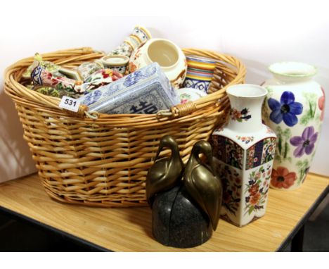 A wicker basket and ceramic contents, etc.