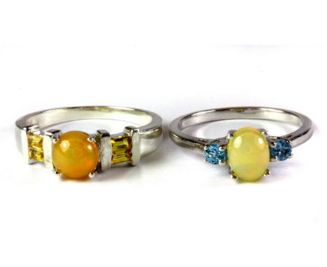 Two 925 silver opal and topaz set rings, (S & S. 5).