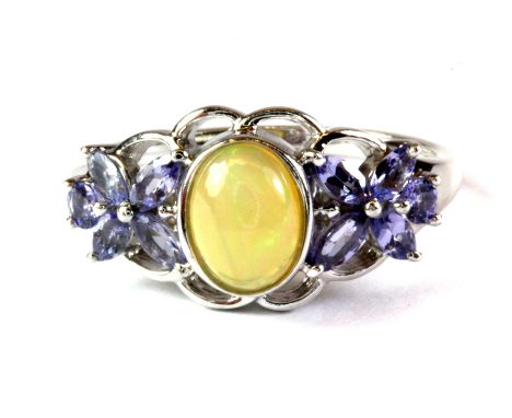 A 925 silver tanzanite and opal set ring, (S).