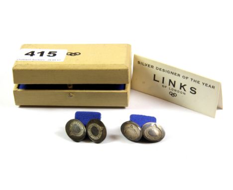 A boxed pair of silver Links cufflinks.