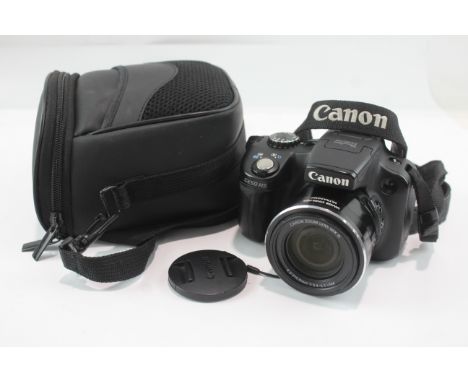 Canon Powershot SX50 HS Digital Bridge w/ Case Canon Zoom Lens 50x IS 12.1 Mega Pixels 4.3-215.00mm f/ 3.4-6.5 USM (Batteries