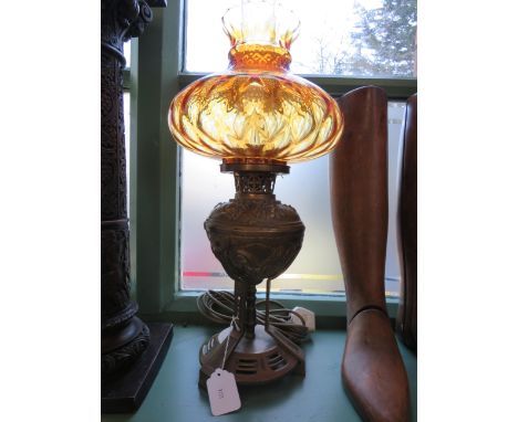 Modern Brass oil effect electric table lamp with metal base and fire coloured shade. Approx 22 inches tall. See photos. 