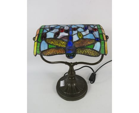 Art nouveau Tiffany style bankers lamp with dragonfly shade.