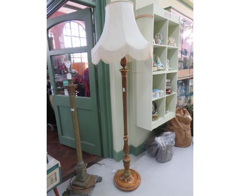 1950's Era Wooden Standard lamp with circular base and carved decorated ends, comes with fancy shade.  Measures approx 77 inc