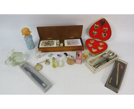 Mixed lot to include miniature perfumes, paperweight, playing cards, parker pen, heart badges etc.