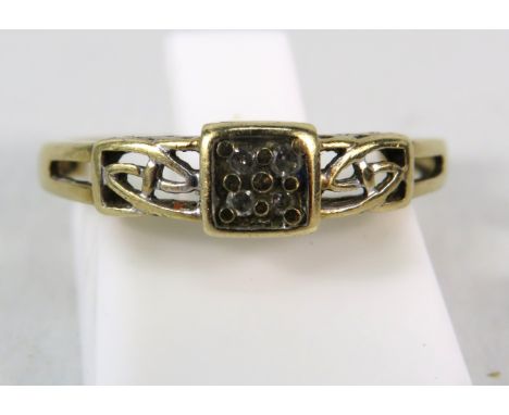 9ct Gold diamond set celtic style ring, finger size "N". 1.5 grams.