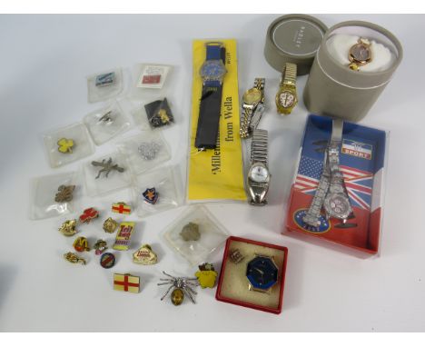 Mixed lot to include wristwatches by Radley and Swatch, a sterling silver spider brooch and pin badges.