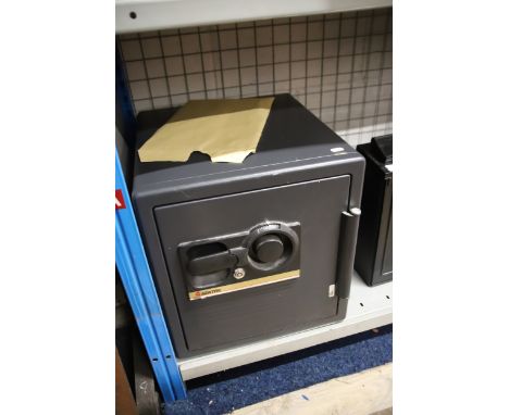 Century Safe with documents and key.  Measures approx 18 x 18 x 18 inches . Heavy Item for collection or Courier only .  See 