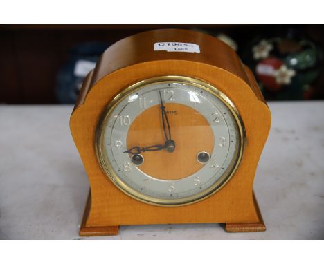 Small Smiths Mechanical Mantle Clock appears to be in working order. Complete with key, see photos.