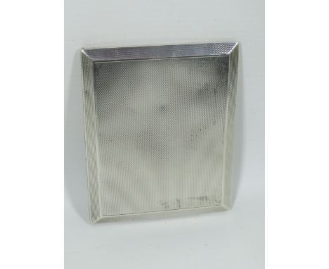 Engine Turned Silver Cigarette case with UK Hallmarks to both segments.  In good order.  Total silver weight approx 175.5.  S