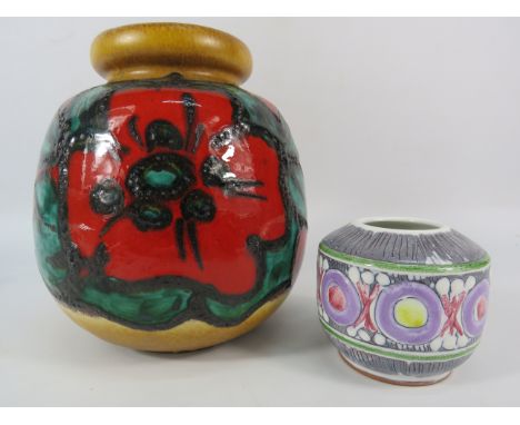 Vintage German fat lava pottery vase plus a Laholm Swedish petite polychromed vase signed to base. The larger of the two meas