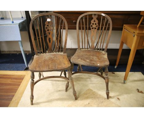 Two Vintage Wheelback chairs with Crinoline Stretcher. In as found condition and would benefit from light refurbishment. See 