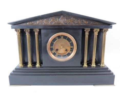 Large French marble mantle clock with six pillars and Greek fighting scene decoration, 17" long, 11.5" tall and 6" deep. Inte