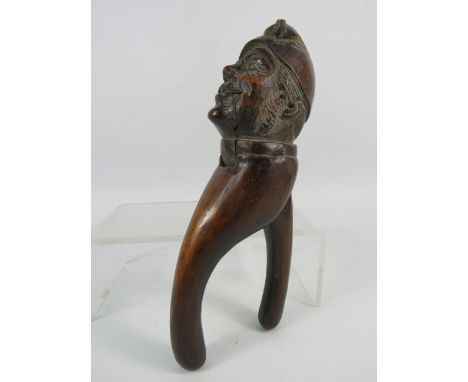 Antique hand carved Black Forrest gnome nut cracker.