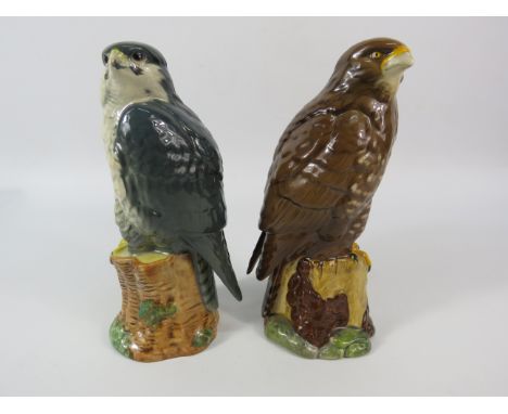 Two Royal Doulton Beneagles ceramic decanters Buzzard and Peregrine Falcon, one full one not.