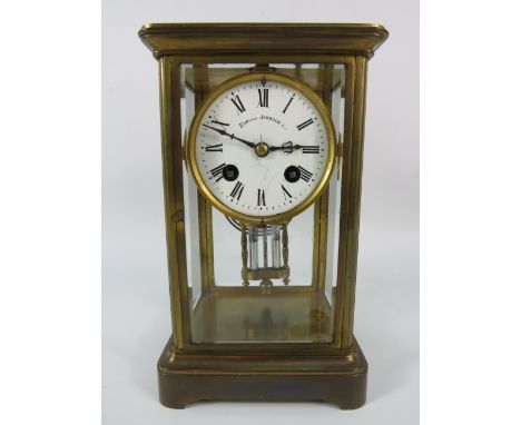 Edmund Johnson enamel face French brass skeleton mantle clock with Mercury Pendulum, 8 3/4" tall.
