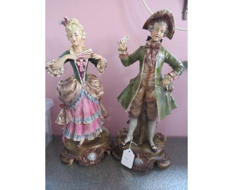 Pair of Mid 20th Century East German Ceramic Figures in Regency Costume. Both in good condition and measures approx 6 inches 