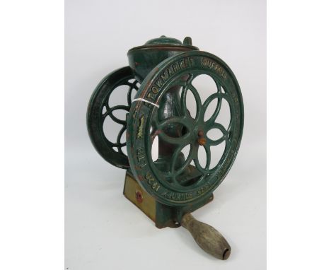 Vintage cast iron Stowmarket coffee grinder. 11" tall, 7" wide.