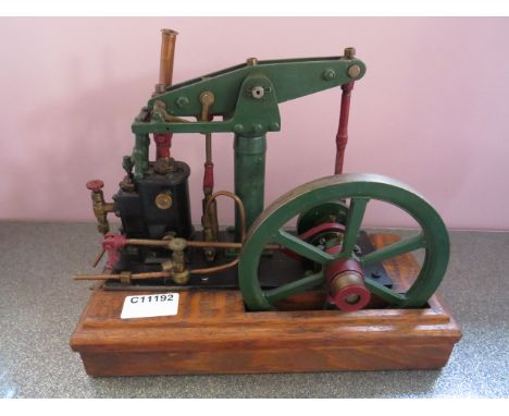 Lovely Model Steam Beam Engine in working order with flywheel, mounted on a wooden plinth. No makers mark visable. Appears to