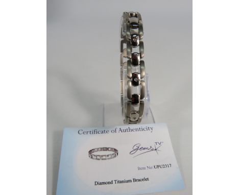 Diamond set Titanium bracelet.