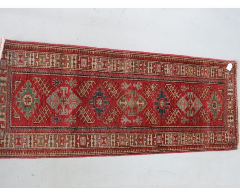 Asian Style Wool Runner with fringed edges, measures 67 x 26 inches. See photos.