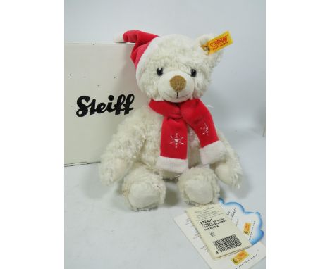 Steiff Christmas Bear with original box and paperwork. In excellent condition.  See photos. 