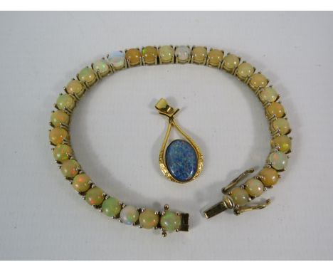 925 silver Welo Opal bracelet and blue opal pendant.