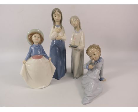 Two Lladro and Two Nao figurines, the tallest stands 9".