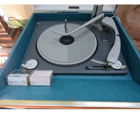 Vintage Dansette Record player on tapered legs. Being the Bermuda Monarch Model. Sound and volume work but turntable intermit