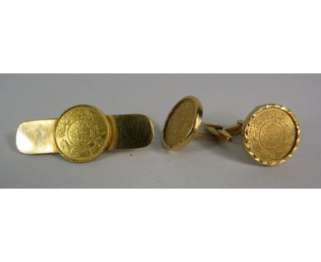 Pair of 18ct gold (marked 750) cufflinks containing Two Saudi Gunayh coins plus and matching tie pin with a saudi Gunayh atta