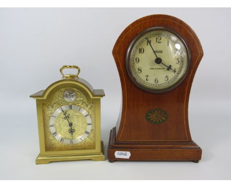 Tempus Fugit Swiza 8 day brass mantle clock plus a vintage Tameside wooden mantle clock both in running order.