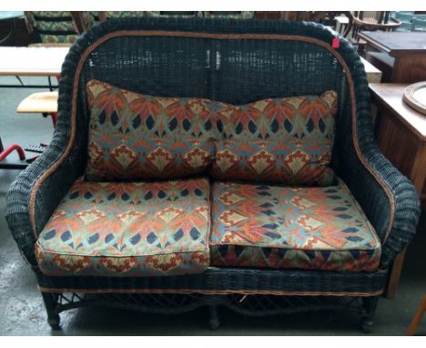 A blue wicker conservatory sofa with cushions and back support in Liberty fabric, 145cmW