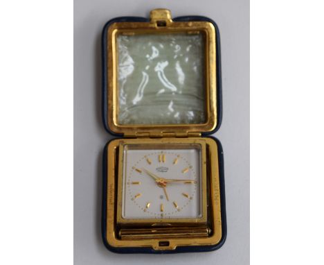 Angelus Lilliput 8 day travel alarm clock in navy leather case, 5.5cm x 5.5cm