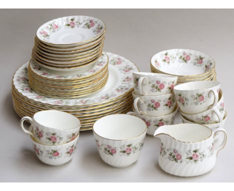 A large quantity of Minton 'Spring Bouquet' pattern fine bone china, highlighted in gilt, consisting of teacups (8), saucers 