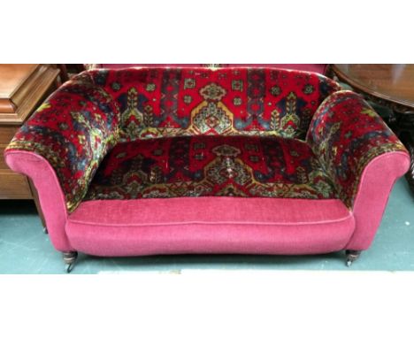 A late 19th century Austrian saddleback sofa, raised on turned legs with casters, formerly the property of Canon Thorpe, 170x