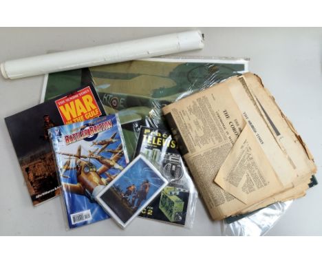 A collection of historical paper, collectors items, and aviation posters, including a large laminated print of a De Havilland